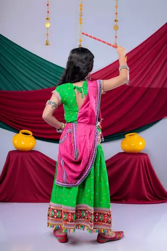 Navratri theme cotton half sleeves kutch work embroidered lehenga choli with dupatta - green