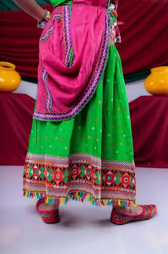Navratri theme cotton half sleeves kutch work embroidered lehenga choli with dupatta - green