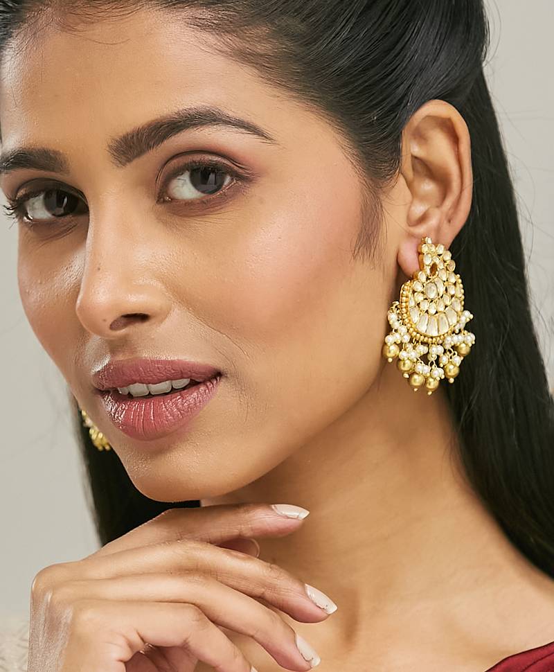 gold plated kundan stone studded & pearl drop beaded crescent shaped chandbalis