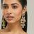 gold plated kundan studded & pearl beaded crescent shaped kanauti earrings