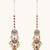 gold plated kundan studded & pearl beaded crescent shaped kanauti earrings