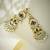 gold plated kundan studded & pearl beaded layered chandbalis