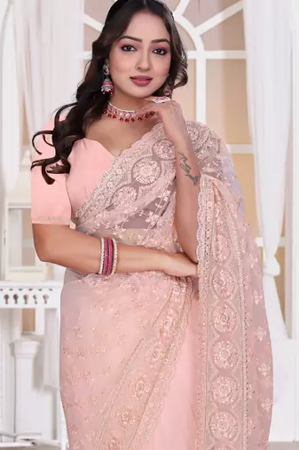 Diamond embroidered resham zari and zarkan work net classic saree in peach for ceremonial