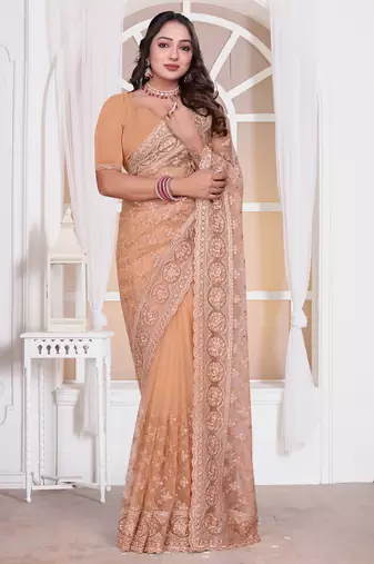 Diamond embroidered resham zari and zarkan work net classic saree in peach for ceremonial