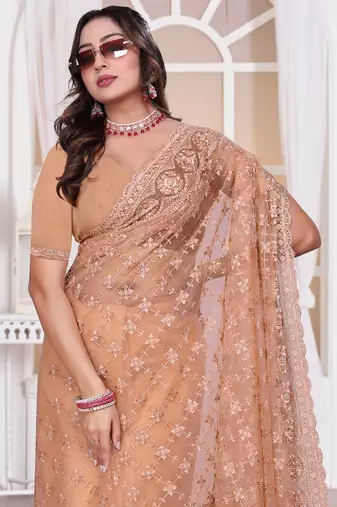 Diamond embroidered resham zari and zarkan work net classic saree in peach for ceremonial