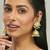 gold plated floral jhumki kundan studded kanauti earrings