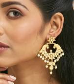 gold plated kundan and pearl earrings with floral stud and intricate crescent design chandbalis