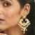 gold plated kundan and pearl earrings with floral stud and intricate crescent design chandbalis