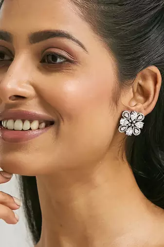 gold plated crystal & zircon stone studded floral studs