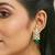 gold plated green gemstone & zircon studded contemporary filigree motif studs