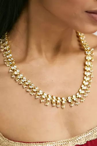 gold plated kundan & pearl studded matha patti cum necklace