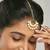 gold plated green stone & kundan studded with pearl drop maang tikka head jewellery
