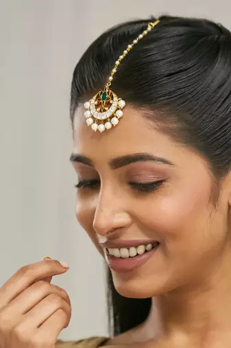 gold plated green stone & kundan studded with pearl drop maang tikka head jewellery