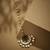 gold plated green stone & kundan studded with pearl drop maang tikka head jewellery