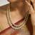 gold plated zircon studded enamel embellished dual layered necklace set