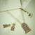 gold plated pearl beaded strings floral motifs enamel pendant necklace set