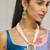 gold plated pearl beaded strings green enamel pendant with floral motifs necklace set
