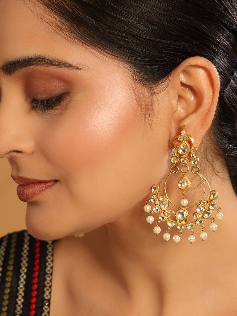 gold plated kundan studded contemporary shaped pearl drop chandbalis