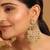 gold plated kundan & pearl studded crescent shaped green beads chandbalis
