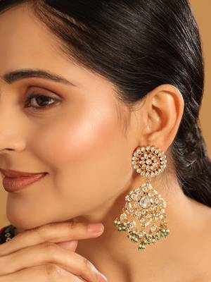 gold plated traditional kundan studded contemporary dangler earrings with pearl and green bead accents 1