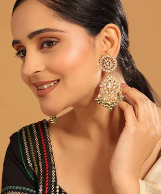 gold plated traditional kundan studded contemporary dangler earrings with pearl and green bead accents 2