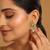 gold plated semi precious green stone studded pearl drop stud earrings