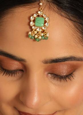 gold plated kundan & green stone embellished maang tikka head jewellery 1