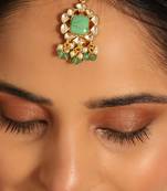 gold plated kundan & green stone embellished maang tikka head jewellery