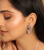 Rhodium plated rhinestone studded floral minimal cotemporary studs