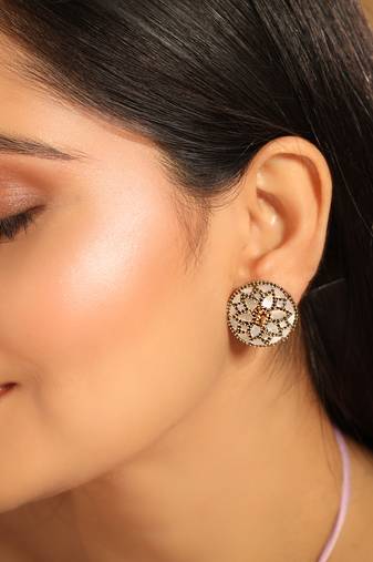 gold plated mother of pearls and stone studded contemporary floral shaped studs