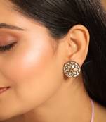 gold plated mother of pearls and stone studded contemporary floral shaped studs