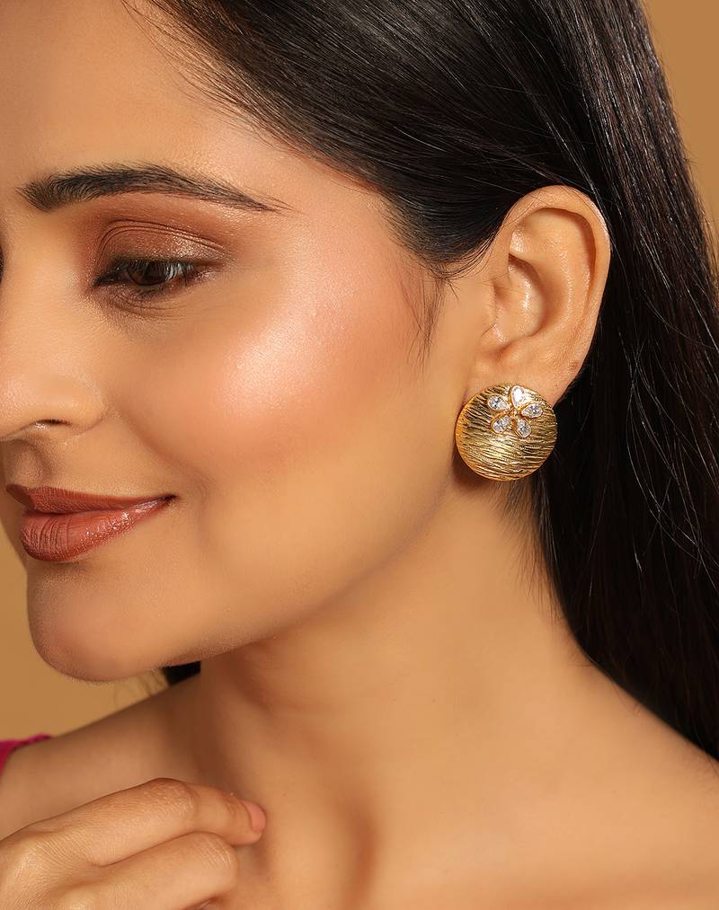 gold plated floral motif stud earrings