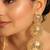 gold plated stone studded contemporary shaped drop earrings