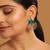 gold plated turquoise enamel studded indo western floral jali statement stud earrings