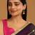 gold plated emerald stone studded ethnic jhumkas