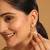 gold plated rose quartz stone studded ethnic jhumkas