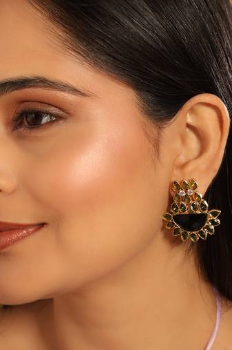 gold plated dark crystal studded contemporary floral shaped stud earrings