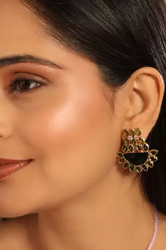 gold plated dark crystal studded contemporary floral shaped stud earrings