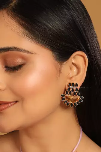gold plated crystal studded contemporary floral shaped stud earrings