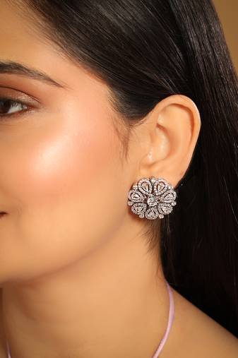 Rhodium plated zircon studded floral statement stud earrings