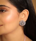 Rhodium plated zircon studded floral statement stud earrings