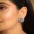 Rhodium plated zircon studded floral statement stud earrings