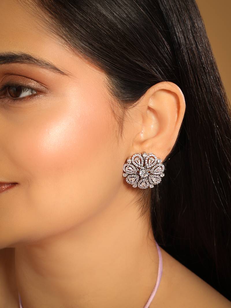 Rhodium plated zircon studded floral statement stud earrings