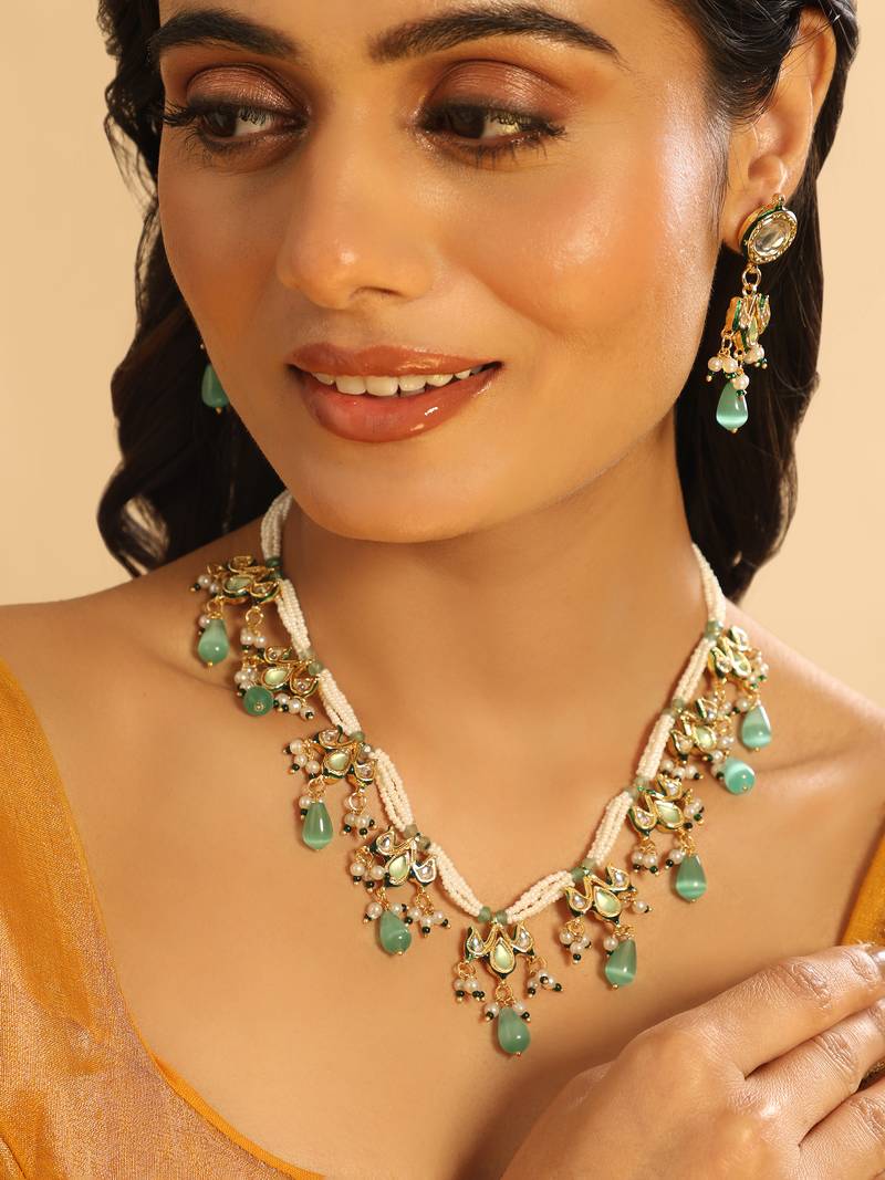 gold plated pearl empress flora green stone drops necklace set
