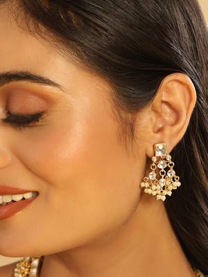 gold plated ivory dusk kundan earrings 1