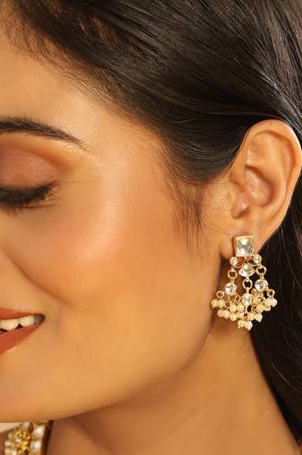 gold plated ivory dusk kundan earrings
