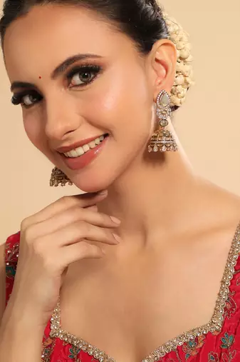 gold plated aureate swirl jhumki earrings