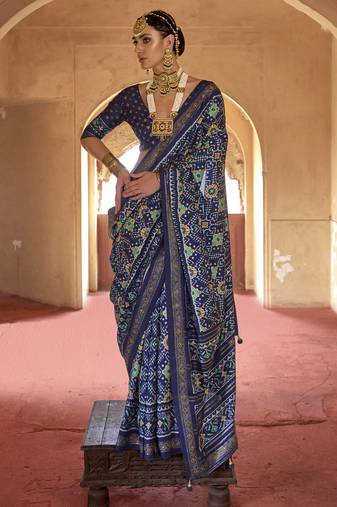 Navy blue poly viscose silk patola printed saree with heavy dimond swarovski work border
