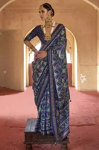 Navy blue poly viscose silk patola printed saree with heavy dimond swarovski work border