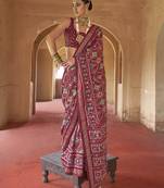Maroon poly viscose silk patola printed saree with heavy dimond swarovski work border